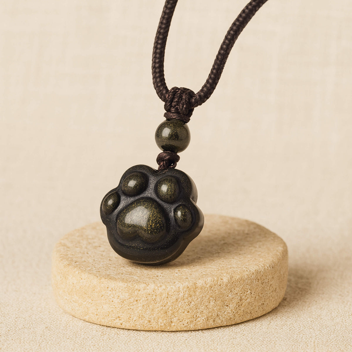 "Eternal Bond" Paw Pendant in Golden Obsidian