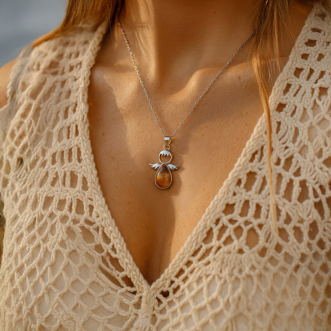 "Little Winged Guardian" Pendant and its Natural Stone
